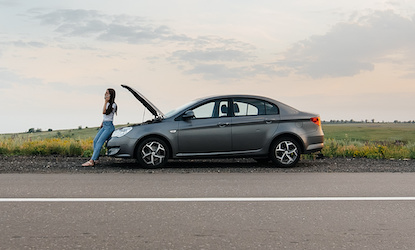 Roadside assistance tech helping a stranded driver in Salt Lake City, UT